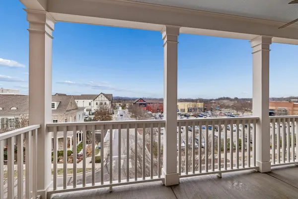a view of a balcony with an outdoor space