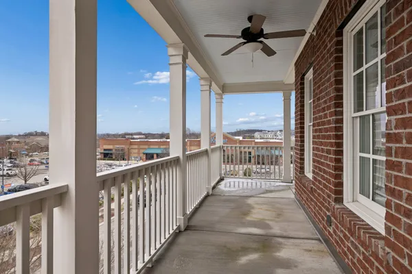 a view of a balcony with city view