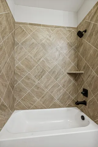 a bathroom with a bathtub