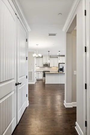 a view of kitchen with wooden floor