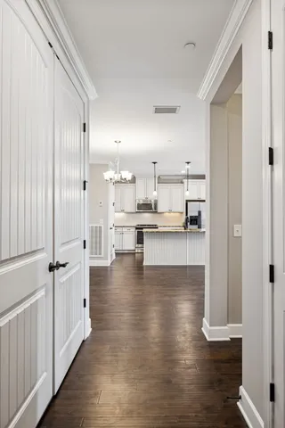 a view of kitchen with wooden floor