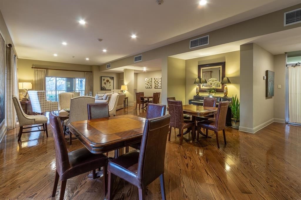 475 North Highland Street, Unit 3F Memphis, TN 38122 - Photo 18 of 24 a view of a dining room with furniture and wooden floor