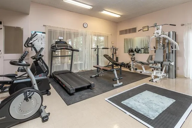 a view of a room with gym equipment