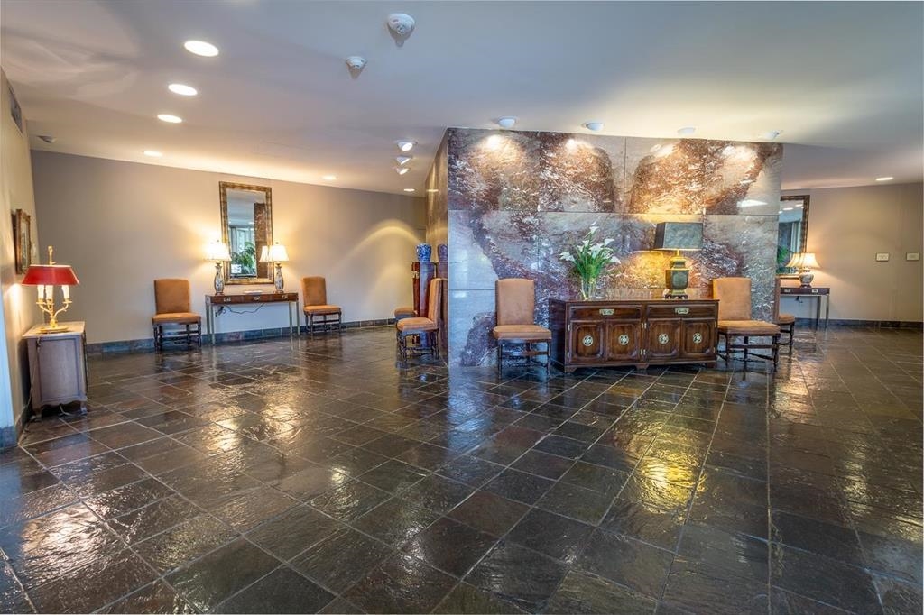 475 North Highland Street, Unit 3F Memphis, TN 38122 - Photo 3 of 24 a dining room with furniture and a floor to ceiling window