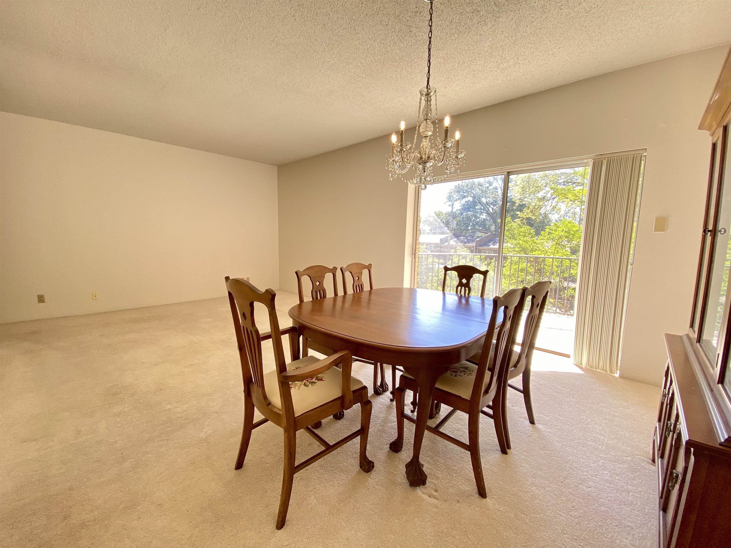 475 North Highland Street, Unit 3F Memphis, TN 38122 - Photo 7 of 24 a view of a dining room with furniture window and outside view