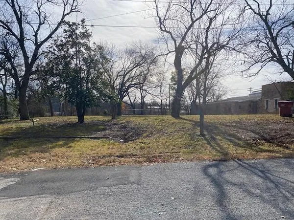 a backyard of a house with trees