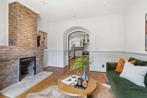 a view of empty room with wooden ceiling