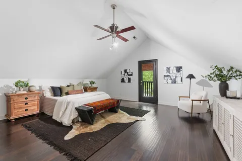 a view of a park with potted plants