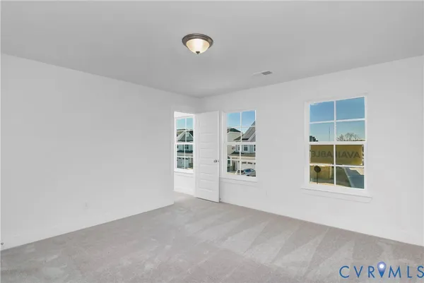 an empty room with windows