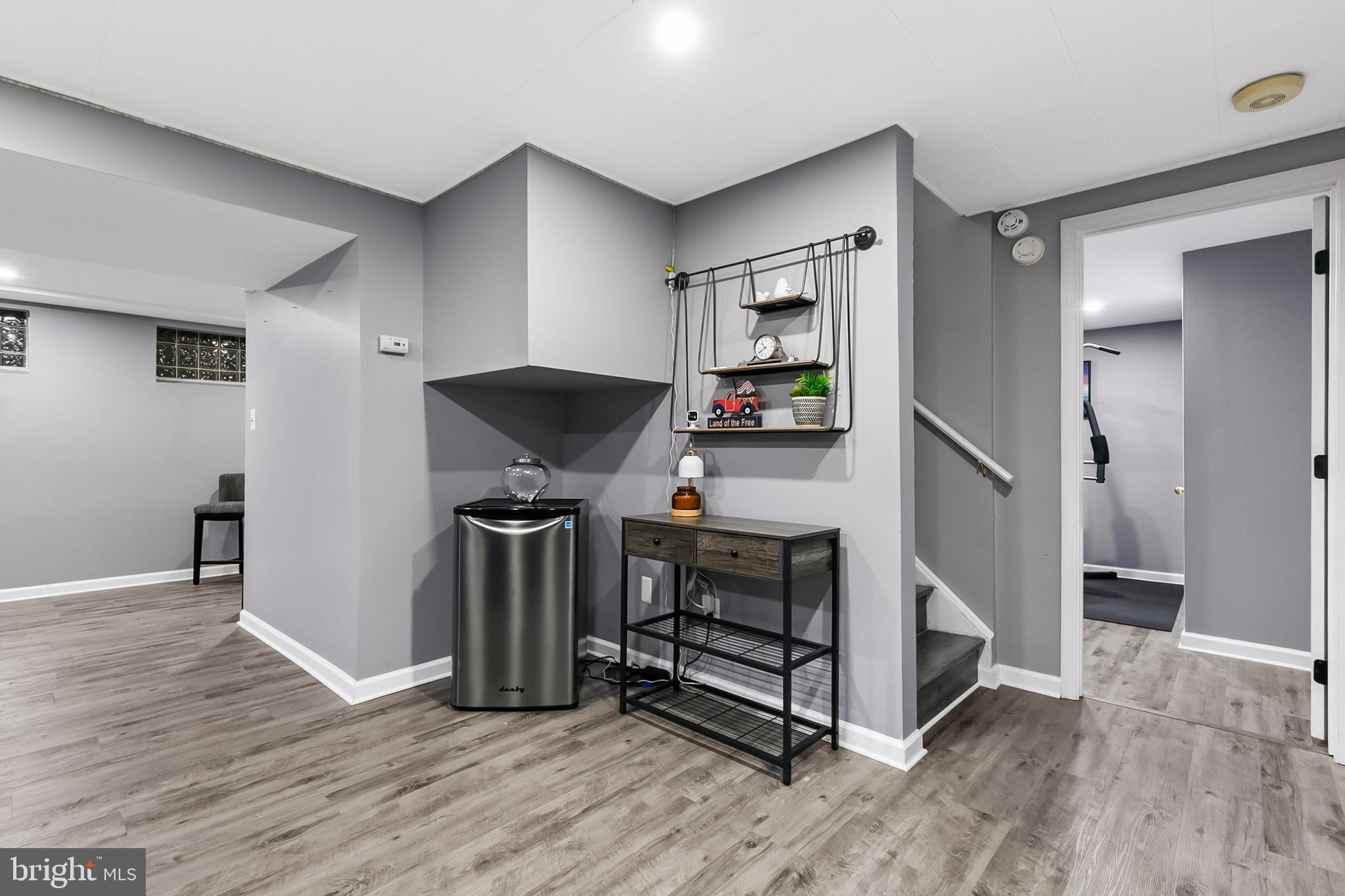 1004 Windmill Lane Silver Spring, MD 20905 - Photo 32 of 60 a view of kitchen with stainless steel appliances wooden floor and chair