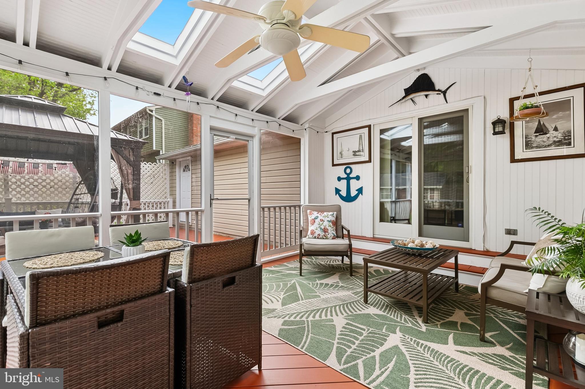1004 Windmill Lane Silver Spring, MD 20905 - Photo 39 of 60 a outdoor space with patio lots of furniture and windows