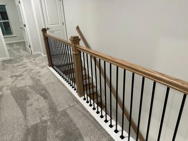 a view of a balcony with staircase