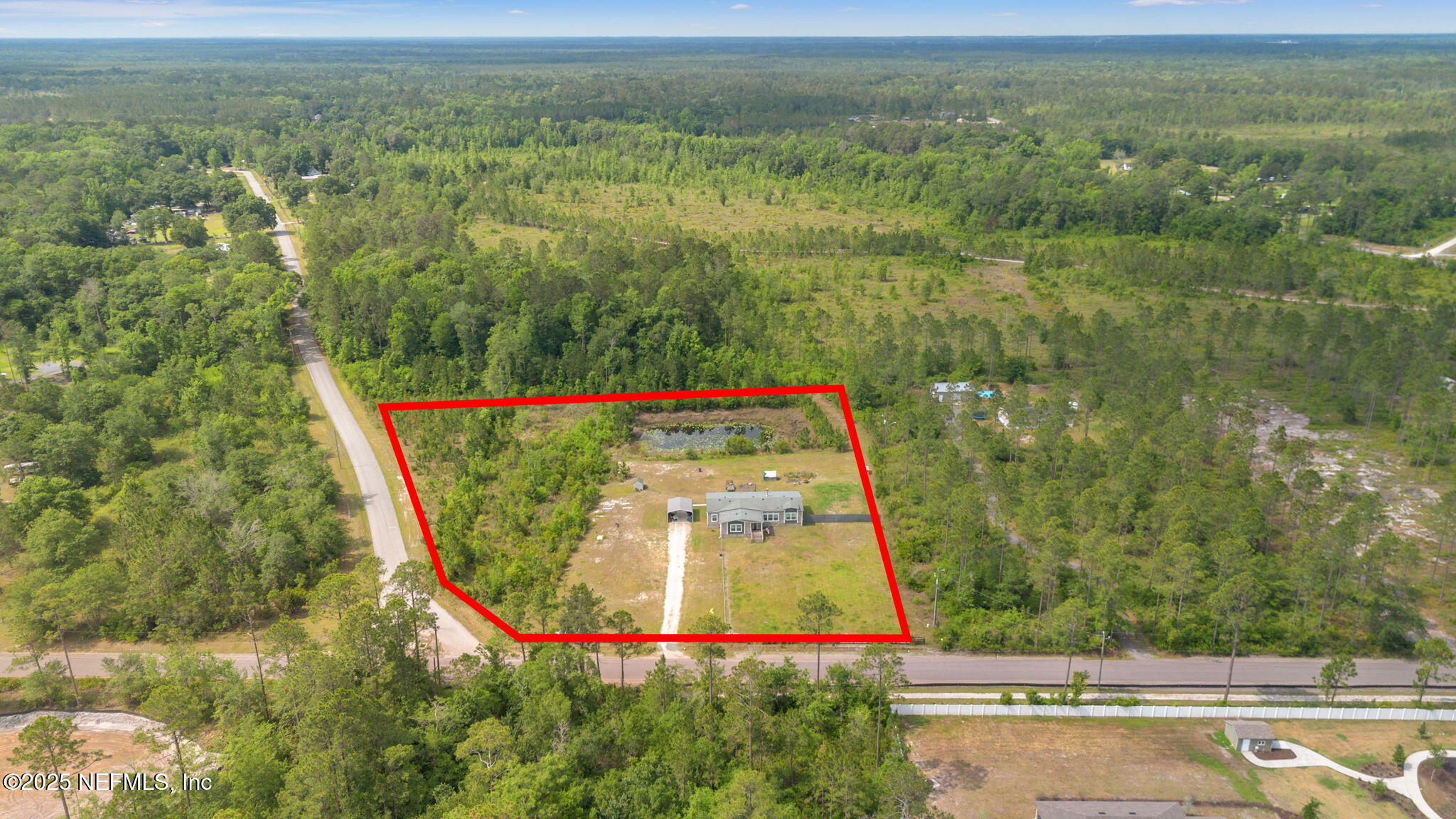 15608 Forest Trail Road Jacksonville, FL 32234 - Photo 32 of 38 33-web-or-mls-DJI_0984-1