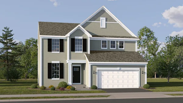 a view of a white house with large windows and a table and chairs