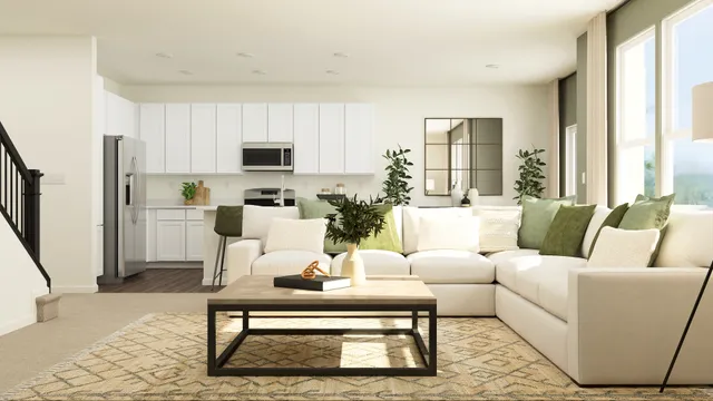 a living room with furniture fireplace and a large window