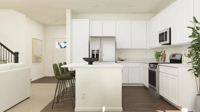 a kitchen with cabinets and wooden floor