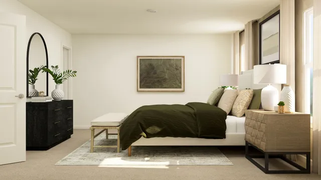 a bedroom with a bed and a dresser