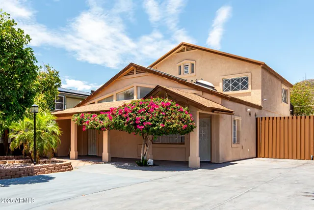 a front view of a house with an outdoor space