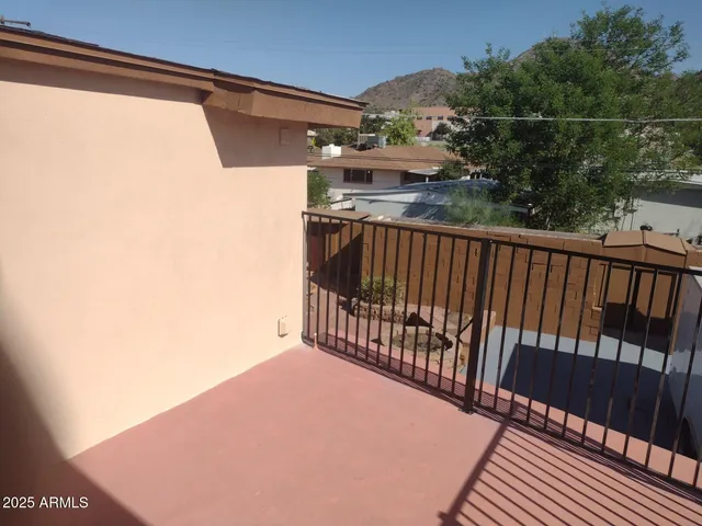 a bathroom with a sink mirror toilet and shower