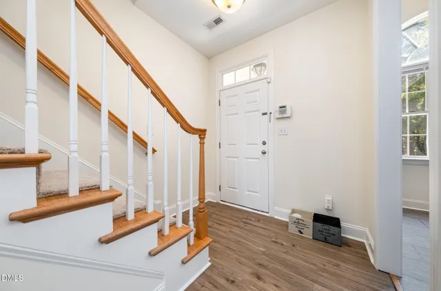 a view of a door and a window