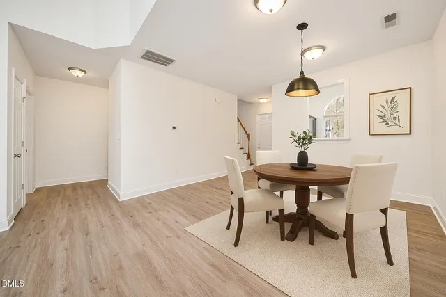 a bedroom with bed couch and window