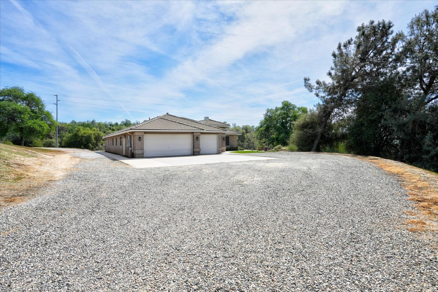 47482 Veater Ranch Road Coarsegold, CA 93614 - Photo 3 of 51 a view of a house with a yard