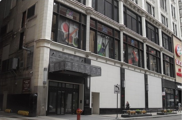 8 West Monroe Street, Unit 2000 Chicago, IL 60603 - Photo 2 of 4 a building with multiple windows