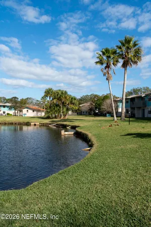 a view of a lake with houses