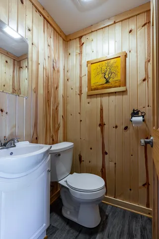 a view of a city with lawn chairs and swimming pool