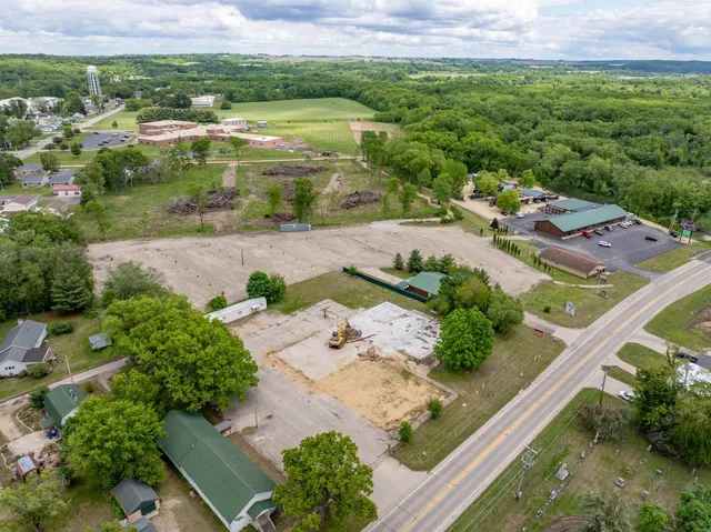 an aerial view of a house with a garden