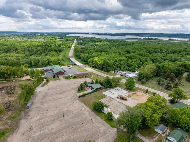 an aerial view of a house with outdoor space