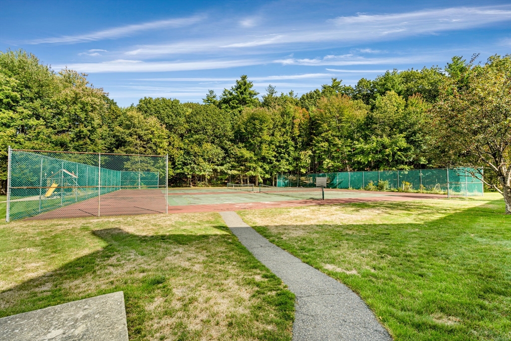 403 Great Road, Unit 5 Acton, MA 01720 - Photo 23 of 25 a view of a swimming pool with an outdoor space