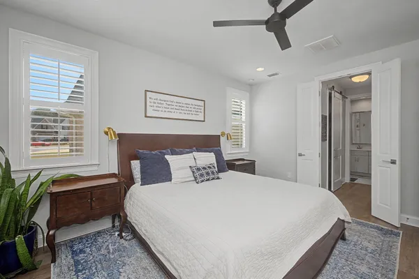 a bedroom with a bed and furniture