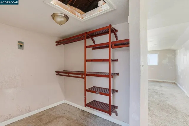 a view of a room with racks on the wall