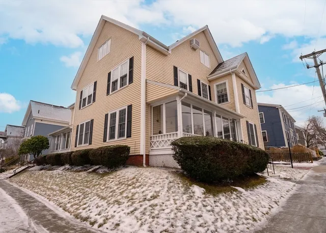 a view of a house with a yard