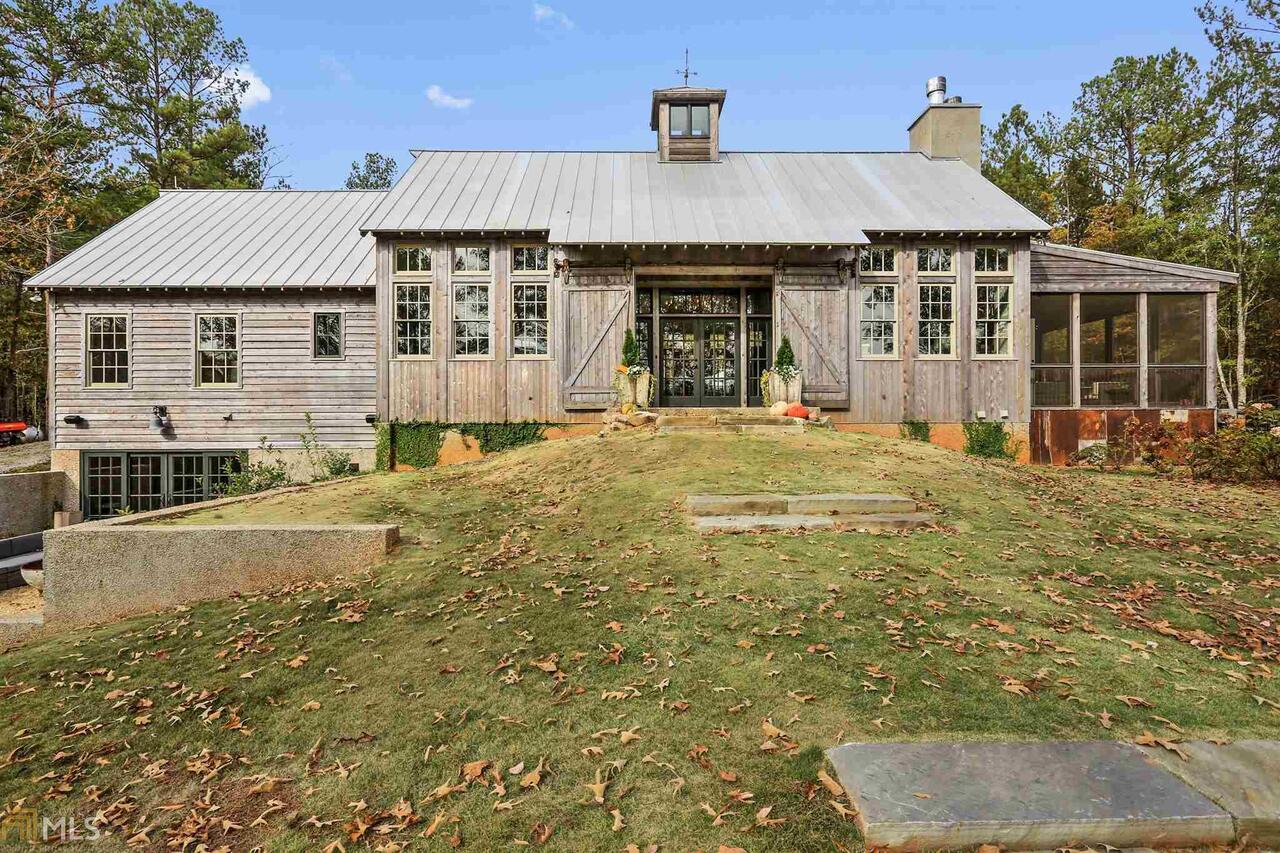 0 Stallings Road Senoia, GA 30276 - Photo 1 of 1 a front view of a house with a garden