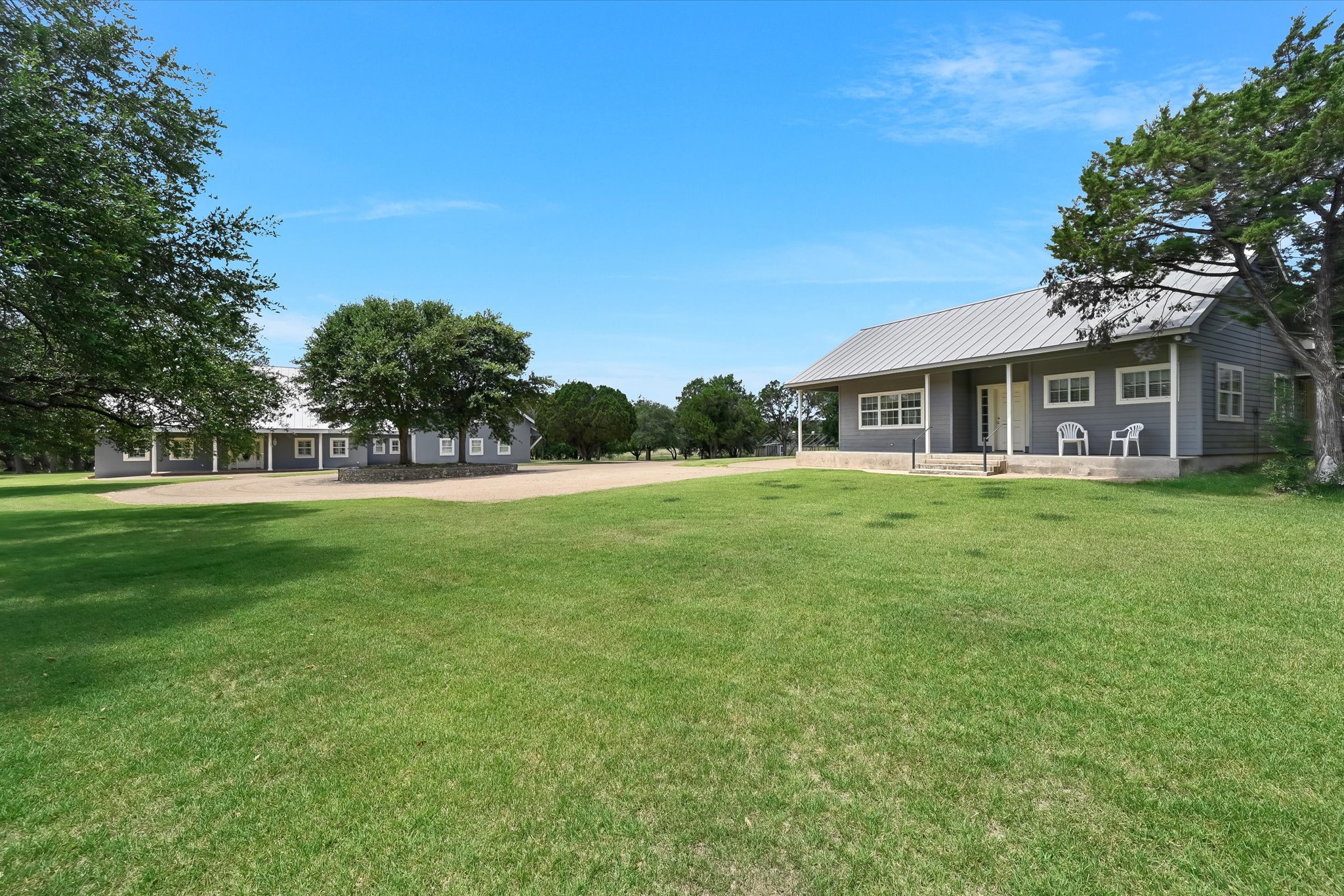 3820 River Road Wimberley, TX 78676 - Photo 25 of 37 Separate guest house with porch adjacent to workshop with separate entrance
