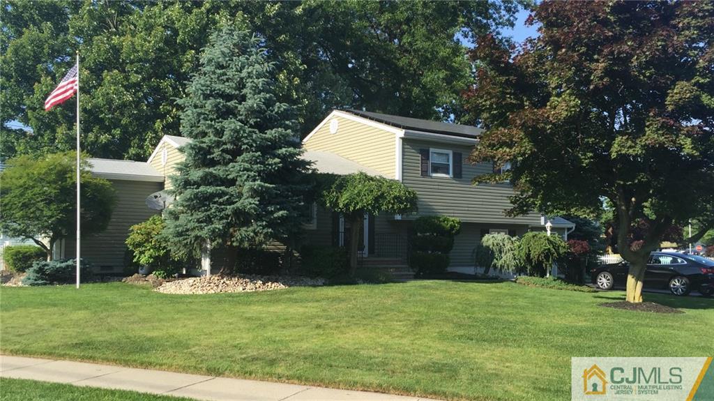 15 Eastlick Road Edison, NJ 08817 - Photo 1 of 23 a house view with a garden space