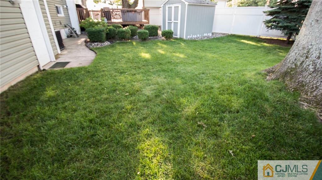 15 Eastlick Road Edison, NJ 08817 - Photo 21 of 23 an outdoor space with garden view and tall trees