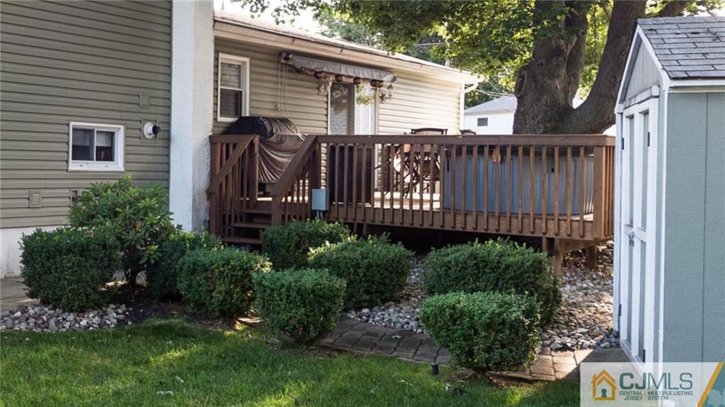 15 Eastlick Road Edison, NJ 08817 - Photo 22 of 23 a view of a house with backyard and sitting area