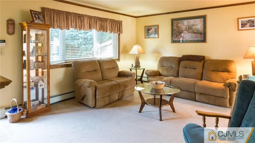 15 Eastlick Road Edison, NJ 08817 - Photo 4 of 23 a living room with furniture and a large window