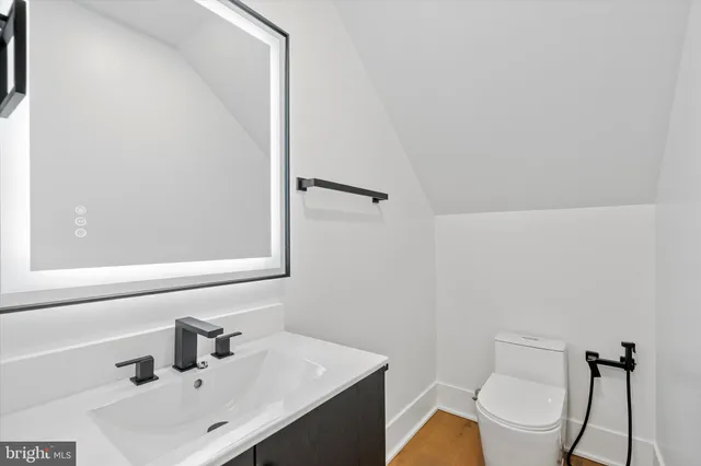a bathroom with a sink and a toilet