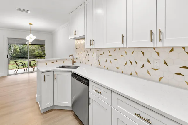 a view of a hallway with white walls