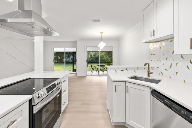 a bathroom with a sink and a window