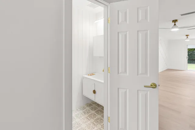 a view of hallway with shower