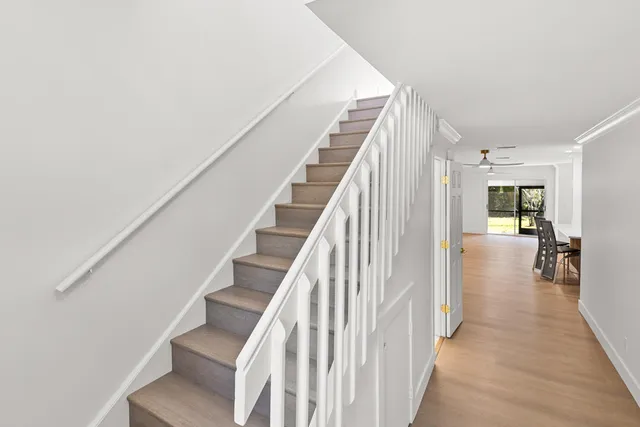 a bathroom with a shower and a sink