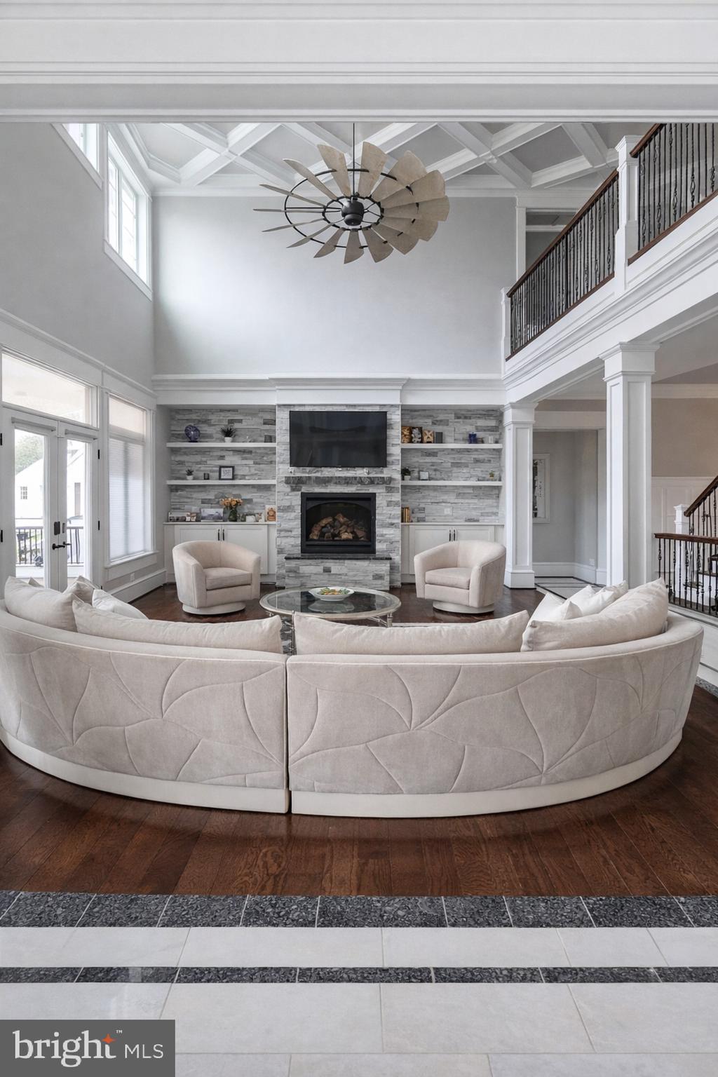 14612 Bristow Road Manassas, VA 20112 - Photo 4 of 12 a view of a living room with kitchen island granite countertop furniture and a fireplace
