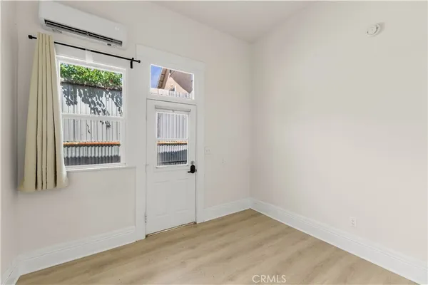 a view of empty room with windows