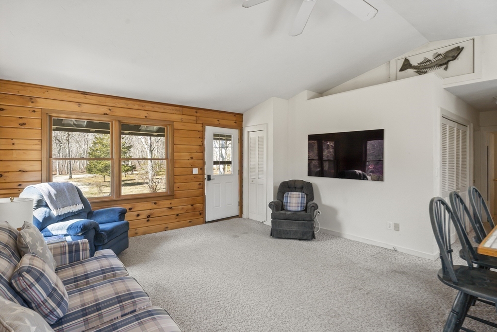 7 Pip'n Road Edgartown, MA 02539 - Photo 27 of 41 a living room with furniture and a flat screen tv