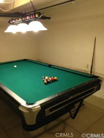 a room with gym equipment and mirror